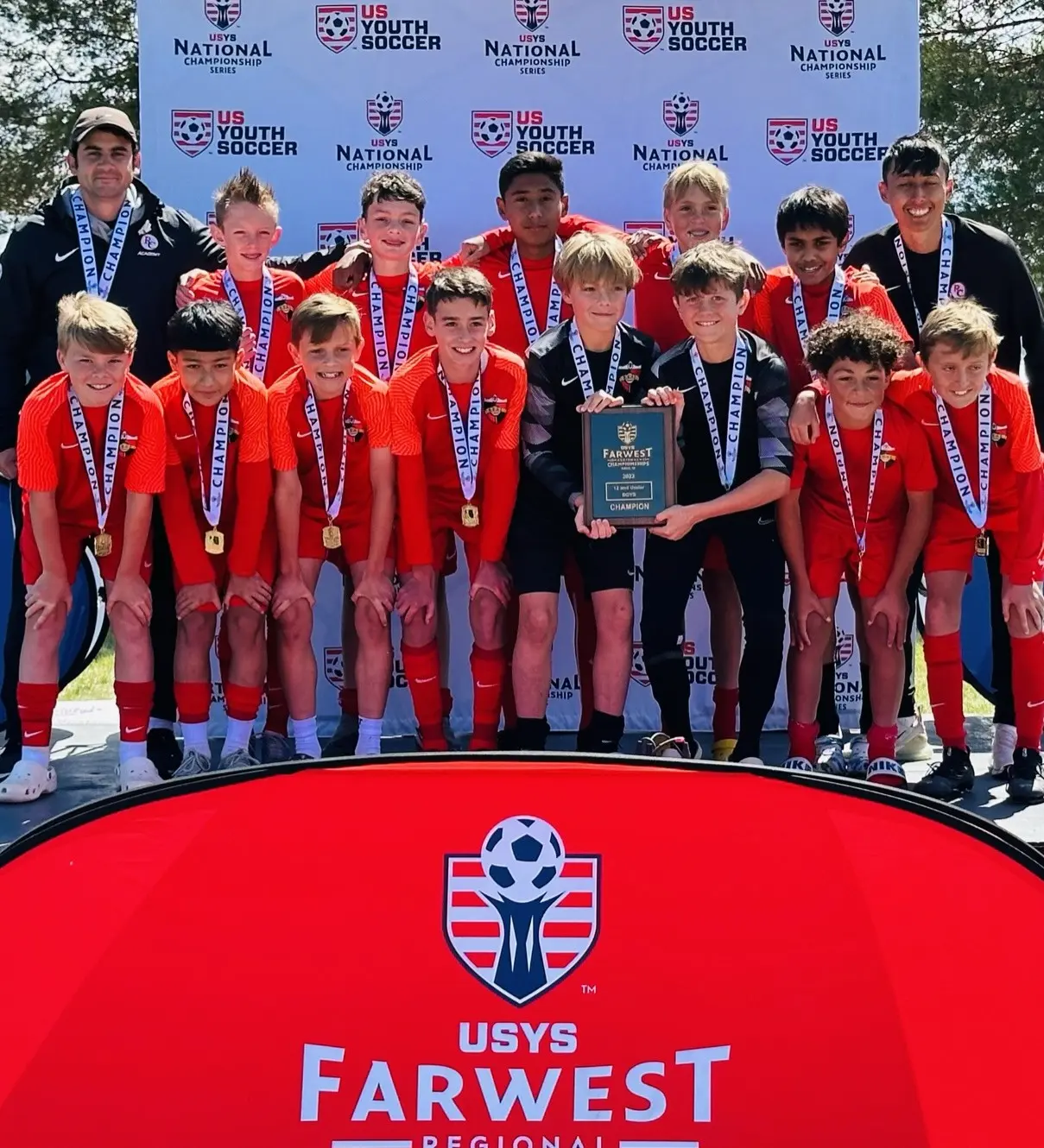 Real Colorado Academy team champions at the USYS Farwest Regional Championships June 2023 with gold medals and champion plaque